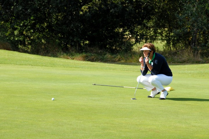 woman planning her put on green